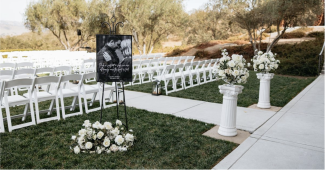 Wedding ceremony seating outside on a sunny day