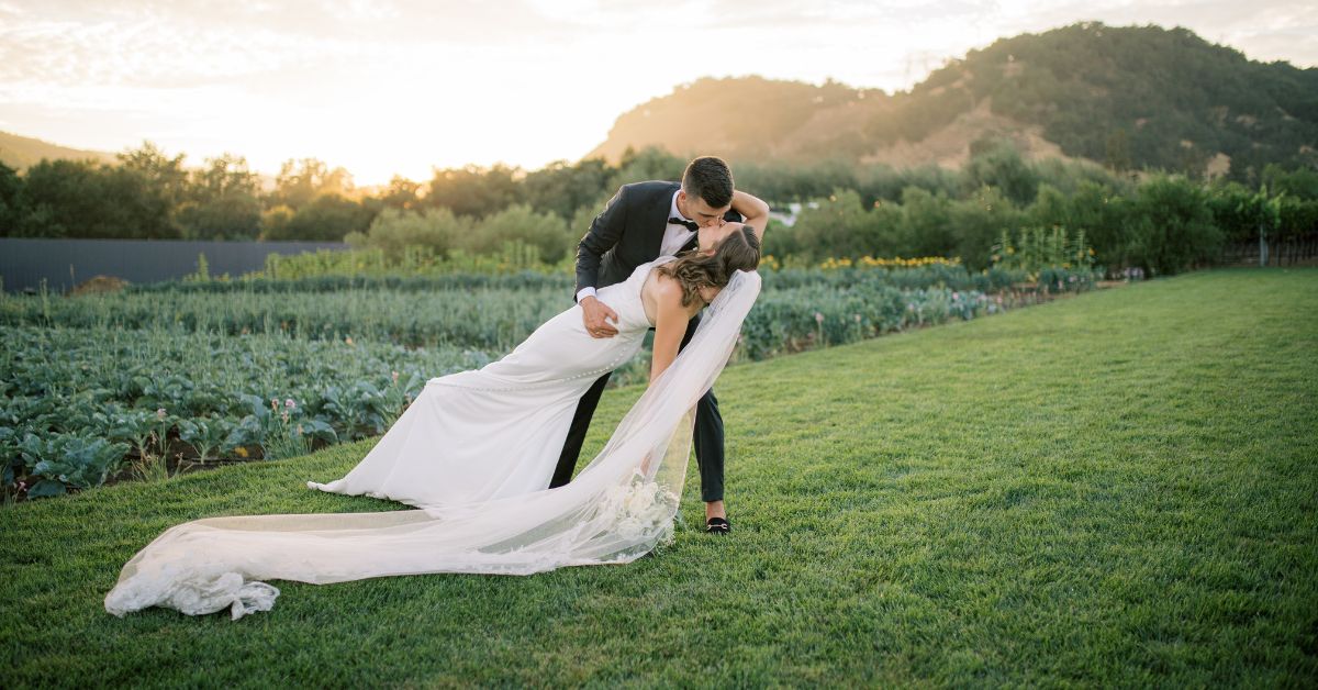 Bride and groom at sunset celebrating a California vineyard wedding at Léal Vineyards