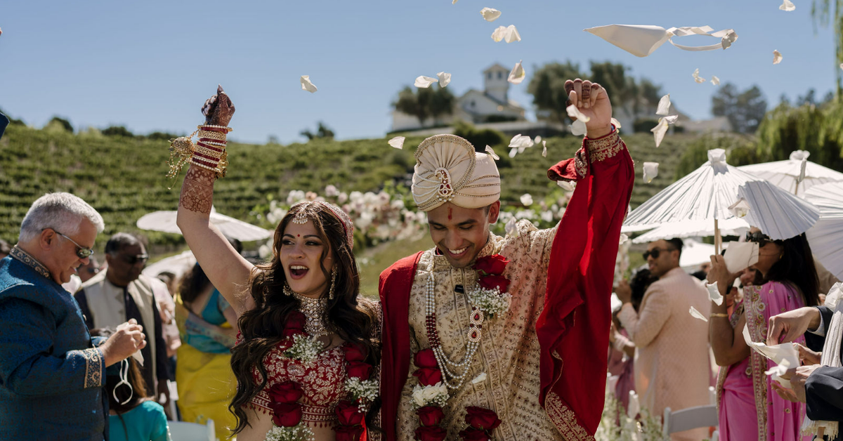 Couple celebrating during an outdoor ceremony at a vineyard wedding venue in California